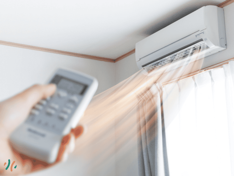 Une climatisation réversible qui envoie un flux d'air vers le bas